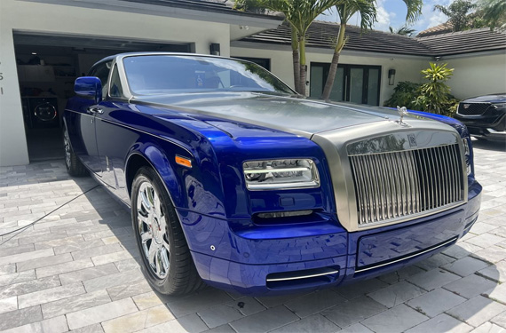 Luxurious blue Rolls Royce showcased by Broward Detailers, highlighting premium car detailing services in South Florida.