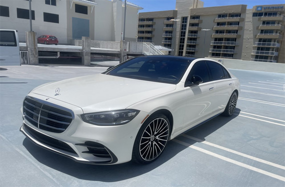 Luxury white Mercedes-Benz S-Class with sleek design, enhanced by Broward Detailers' premium car detailing services in South Florida.