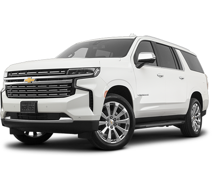 White Chevrolet Suburban SUV showcasing luxury and space, perfect for family trips and adventures, detailed by Broward Detailers in South Florida.