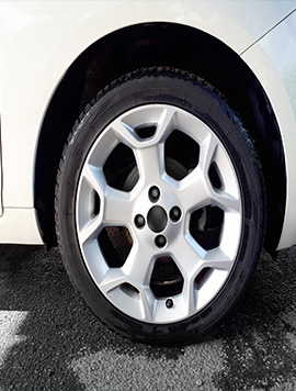 Broward Detailers' iron removal service showcasing a clean car wheel, effectively removing iron particles to enhance the vehicle's appearance and protect its finish in South Florida.