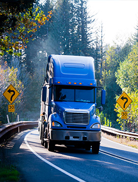 Professional semi truck detailing service on the road, enhancing vehicle appearance and protection in South Florida.